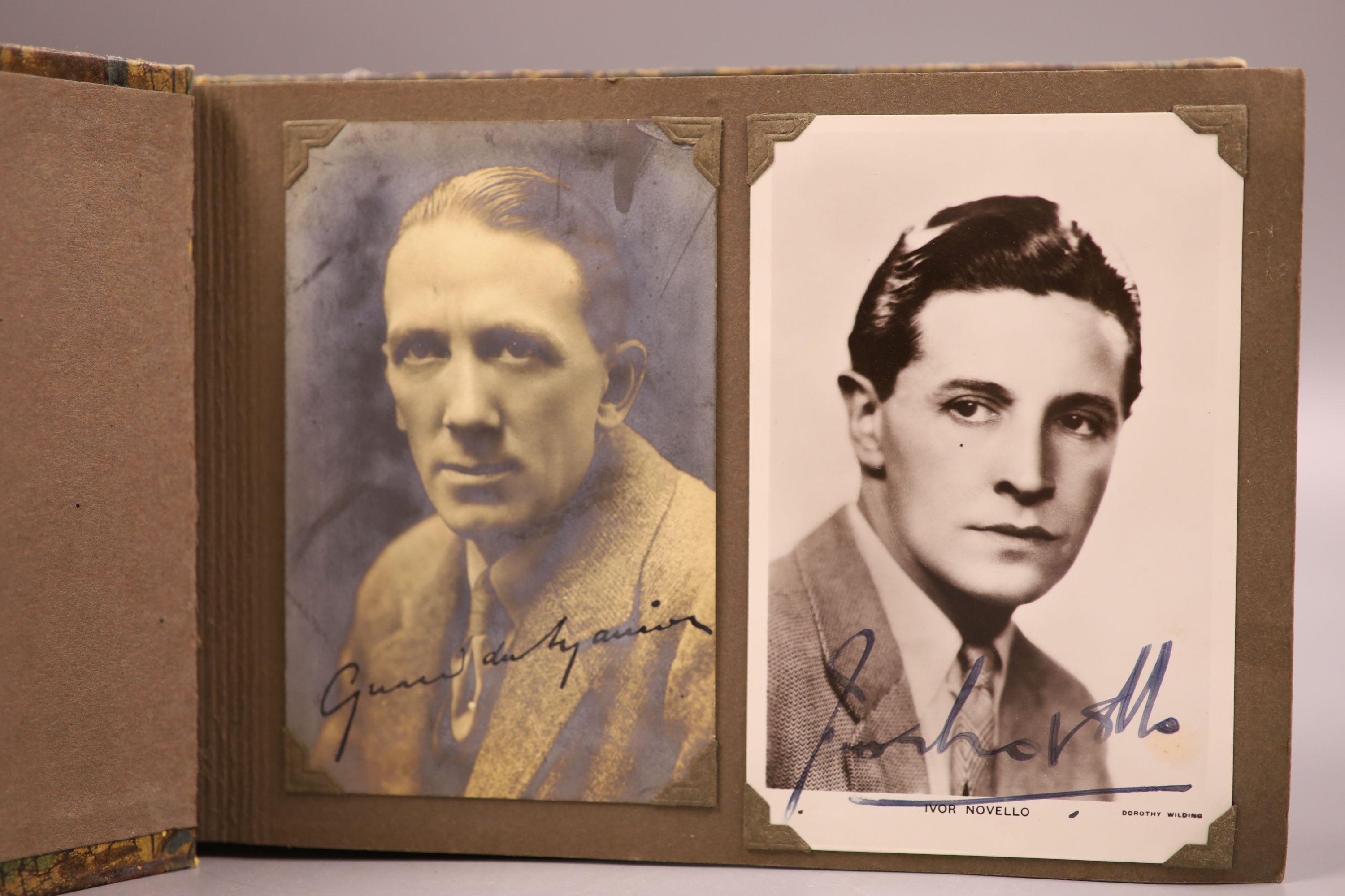 An album of 1930s monochrome postcards including film stars, some signed, letter and other signatures